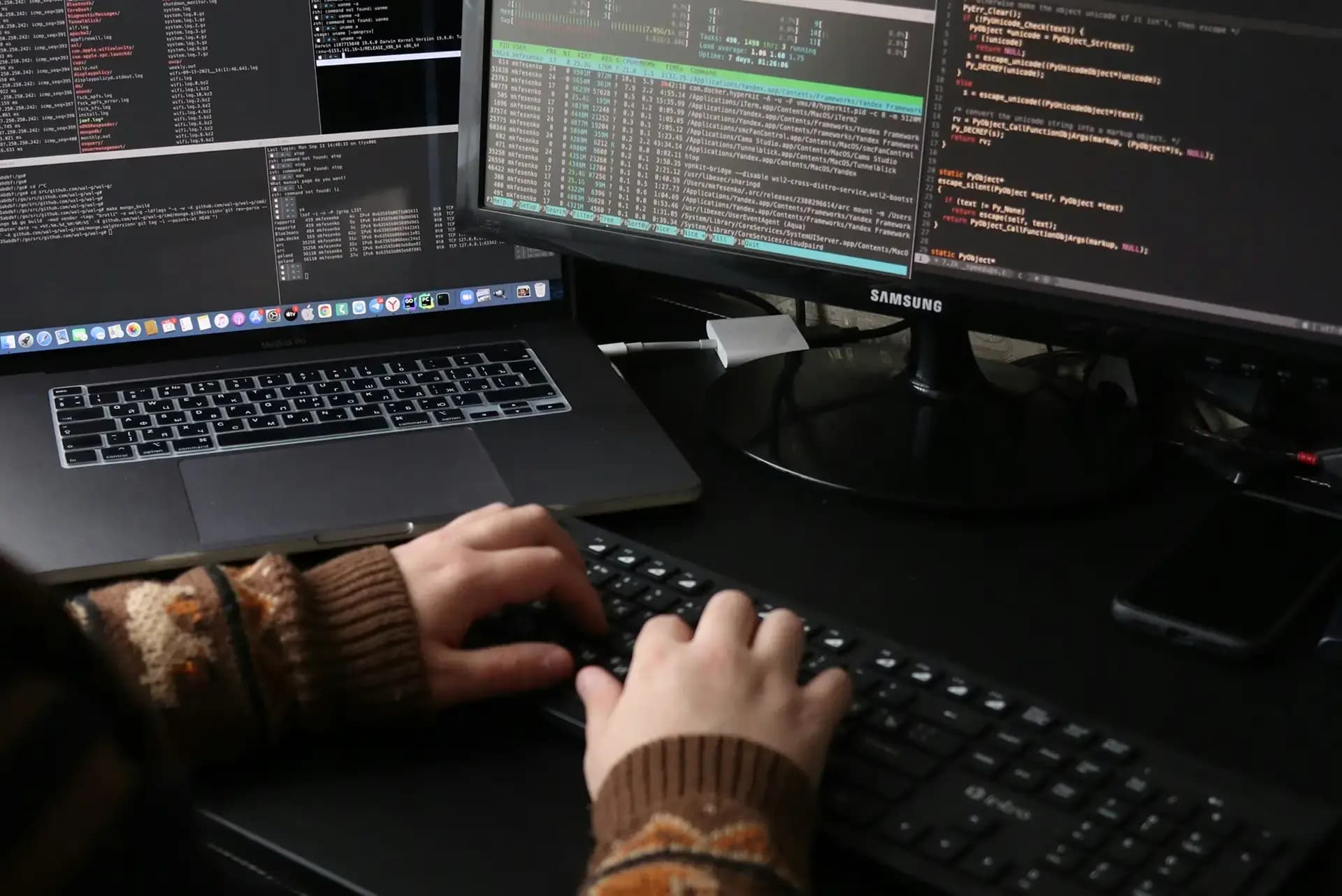 A software developer is coding